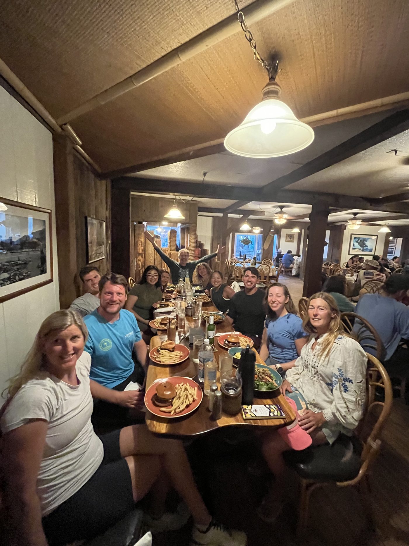 The group sharing dinner together after a day on the water